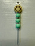 Teal Smiley Face Poker Tool